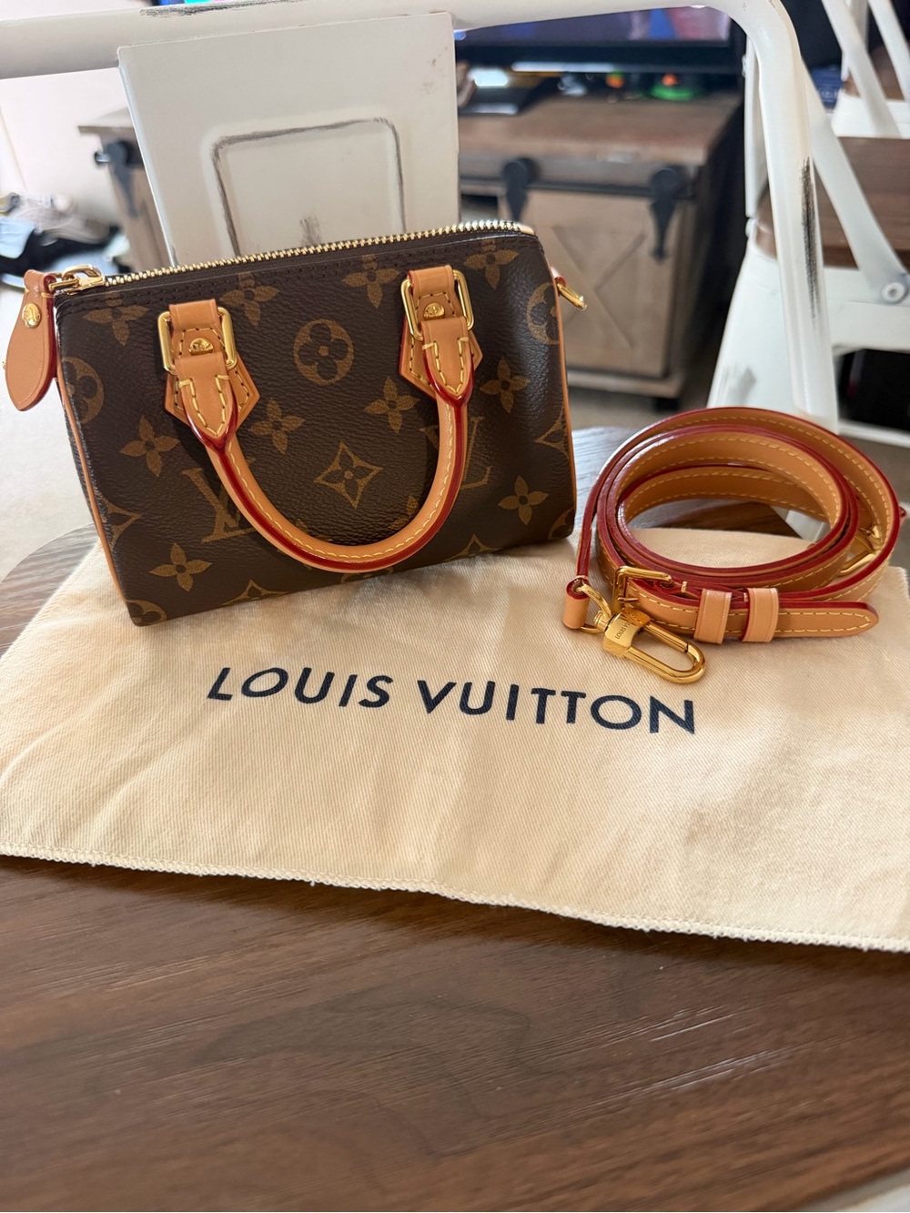 Louis Vuitton Brown Monogram
Mini Speedy Handbag